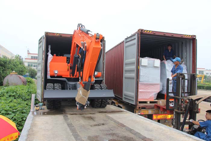 热烈祝贺沃尔华集团 60台轮式挖掘机批量出口泰国